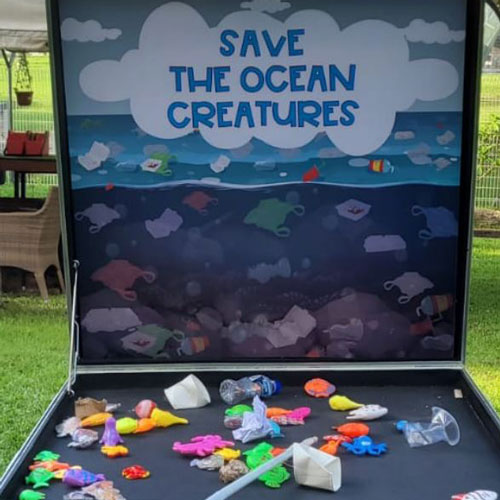 Shoot the pollution monster carnival game booth rental singapore