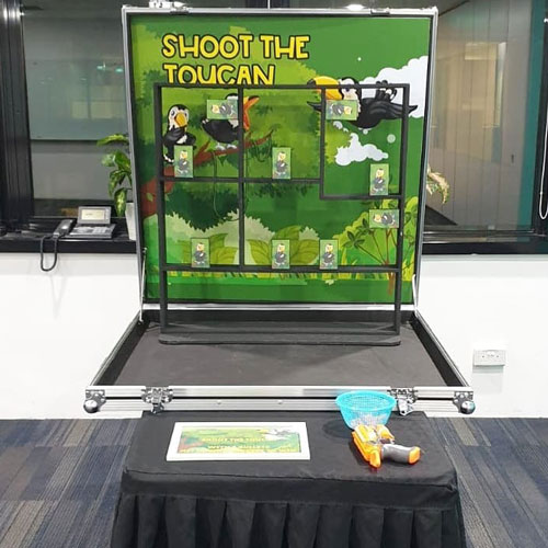 Shoot the toucan carnival game booth rental singapore