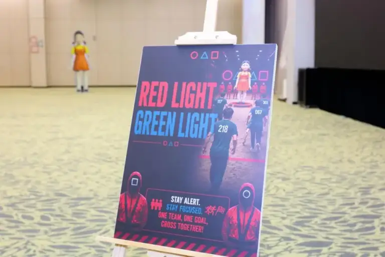 Red Light Green Light game signage at a Squid Game-inspired team building event in Singapore